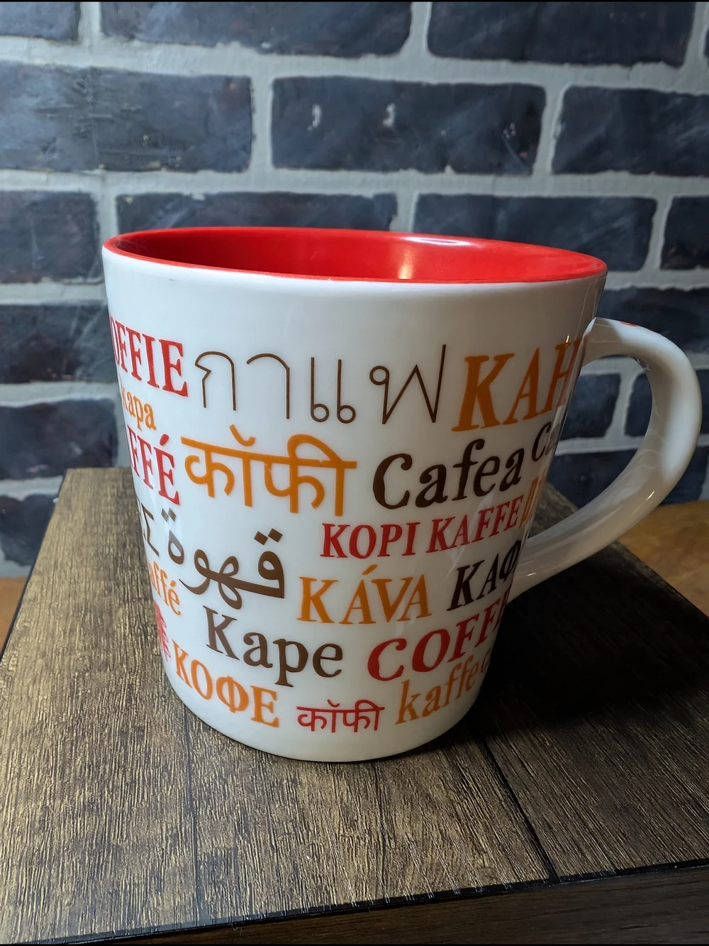 White and Red Coffee Mug with Multilingual 'Coffee' Design